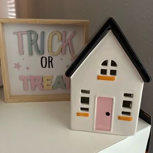 Hyde and Eek boutique lit house and pastel trick or treat sign
